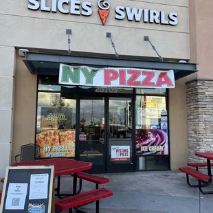 Front entrance with outdoor seating