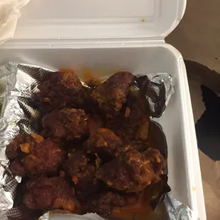 Looked like wings that were left out all day and slapped on top of minimal sauce...