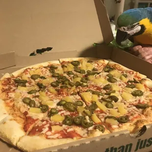 Sunshine checking out our yummy pizza