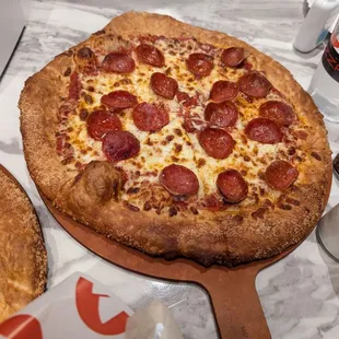 Pepperoni pizza - 16 dollars