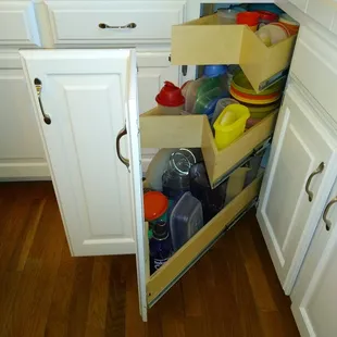 Avoid the frustrations of a Lazy Susan. These three slide outs have more square inches of storage than your Lazy Susan out where you need it