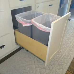 Make recycling easy with a trash bin that pulls out!