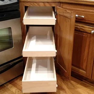 3 slide out shelves replace a lazy susan to bring out the space for easier access.