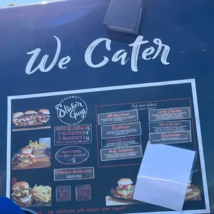 a menu on the side of a food truck