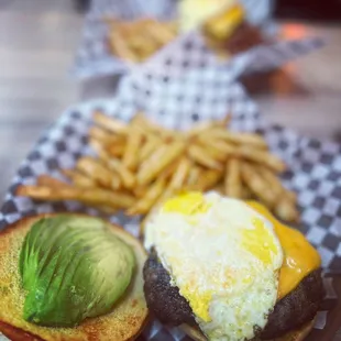 8oz cheeseburger with fried egg and avocado