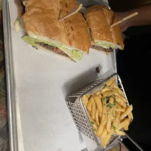 Tri tip sandwich with garlic fries