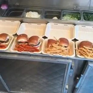 everal trays of food on a counter