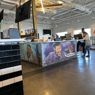 a man and a woman at a counter