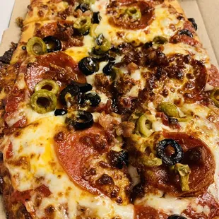 pepperoni, olives, and cheese