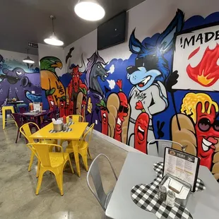a colorful mural in a restaurant