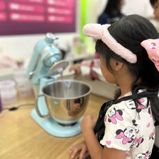 Birthday girl mixing her slime! A budding baker - mark my words!