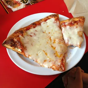 Kids slice of pizza (minus a few bites)