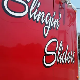 he side of a red trailer