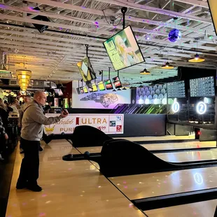 a bowling alley full of people