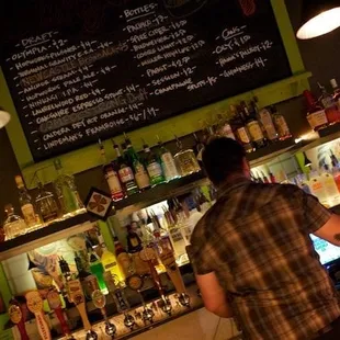 a bartender at the bar