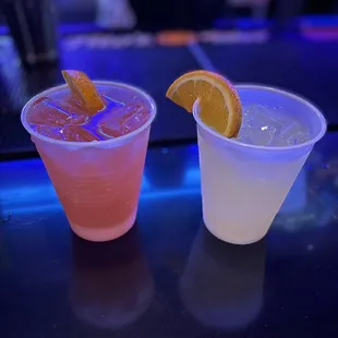 two drinks in plastic cups