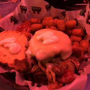Great food, burger with season tots to perfection