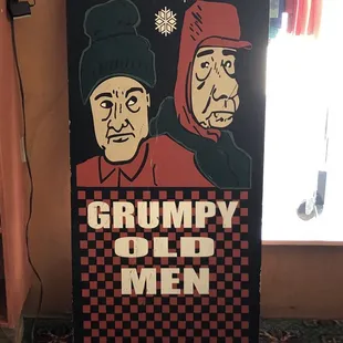 grumpy old men on a sign