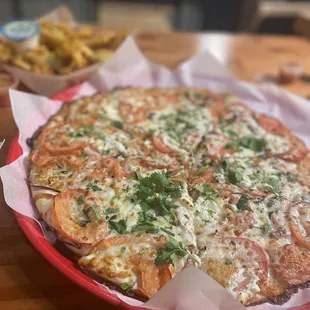 Whole Tomato Pizza ($28) was refreshing and the goat cheese added a nice zing to the palate.