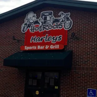 the front of a sports bar and grill