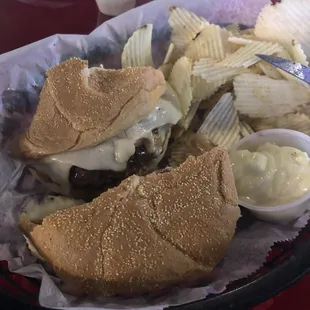 a sandwich and chips in a basket
