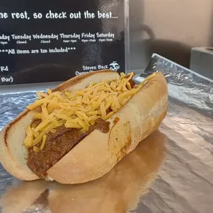 Different view of my kick azz devil dog 100% Angus Cut Beef weiner and beanless chili both items from Texas Chili co. Kick azz Amarosa roll