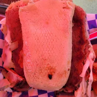 Untoasted bread, didn't fold, chop, or do anything to the meat.