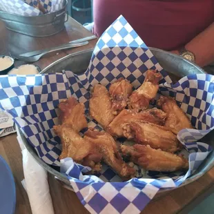 This was the garlic parm wings... the chicken was tender and juicy, the coating was very sparse and almost too crispy.