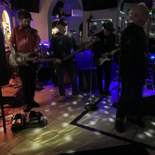 a group of people playing music