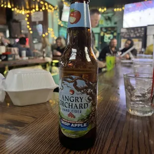 a bottle of angry orchard cid