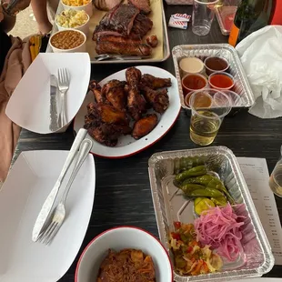 1/2 lb. Jackfruit Chicken Wings 1/2 Rack of Ribs 1/2 lb. Brisket Sausage Link 1/2 lb. Turkey Mac and Cheese Baked Beans Potato Salad sauces