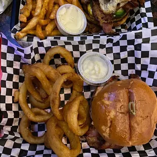 Cowboy burger with onion rings and Death by Burger with french fries