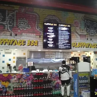 a man standing in front of the counter