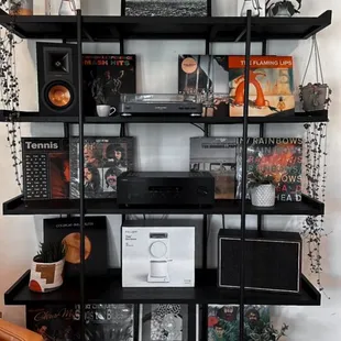 a bookshelf with various items on it