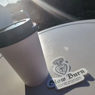 a cup of coffee on a table