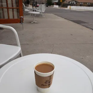 a cup of coffee on a table