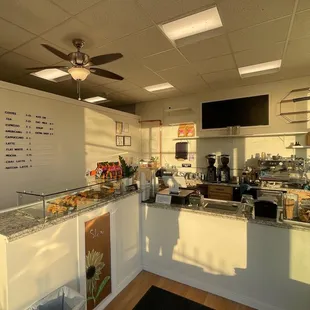 a coffee shop with a ceiling fan