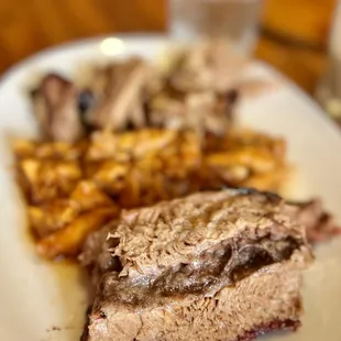 a plate of meat and french fries