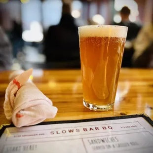 a glass of beer on a table
