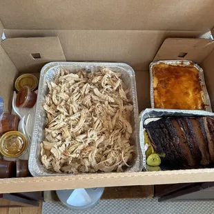 The spread- Apple smoked chicken, Brisket, Mac N Cheese with sauces on the side