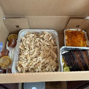The spread- Bbq Apple smoked chicken, Brisket. Mac N Cheese with sauce on the side