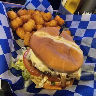 Mushroom Swiss burger with tots