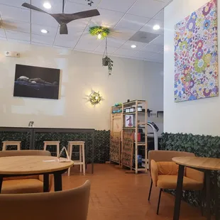 Inside, towards the back, right past the main counter.