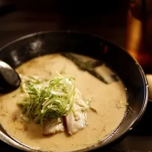 spicy slurpin ramen with chashu - check in on yelp to get a free egg!