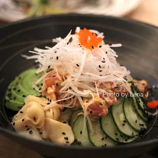 Ahi Poké Donburi ($20) - sesame-soy marinated tuna in spicy mayo, cucumber, avocado, daikon on sushi rice.