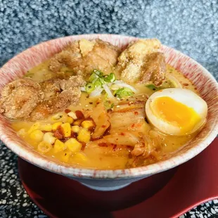 DFFC Miso Ramen: a spicy delight! Crispy duck fat fried chicken, fresh noodles, spicy miso broth, kimchi--a symphony in a bowl!