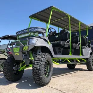 T-Rex, our monster 8-seater cart. He roars through town and is sure to turn a lot of heads!