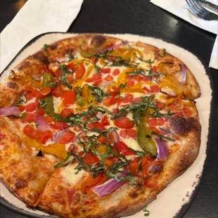 Build your own with roasted peppers, tomato, red onion, and spinach
