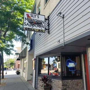 Welcome to Sly's Midtown Salooon  "Your Friendly Neighborhood Salooon &amp; Grill"