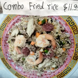 a plate of food with shrimp and rice